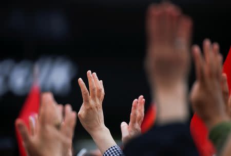 Supporters of Turkish President Tayyip Erdogan gesture during a rally in Istanbul, Turkey June 22, 2018. REUTERS/Alkis Konstantinidis