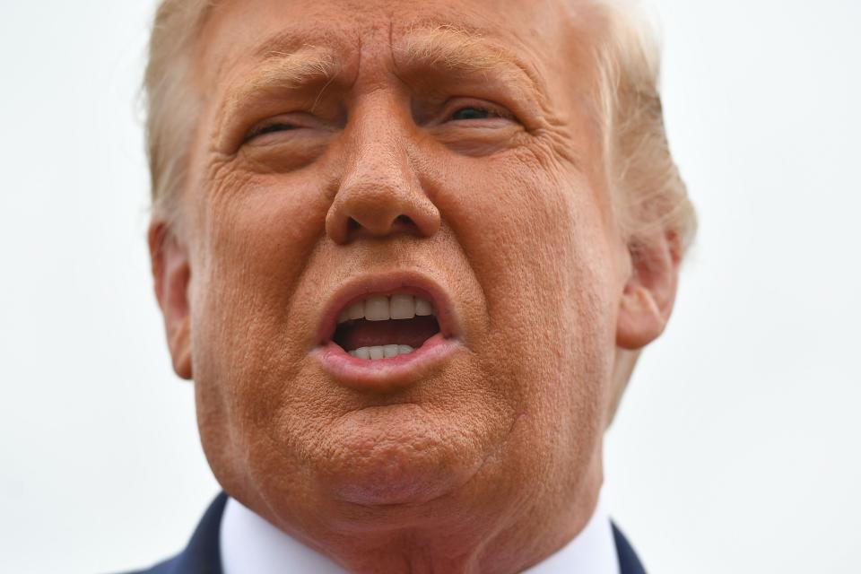 President Trump speaks to the media departing from Andrews Air Force Base in Maryland for Kenosha, Wisc., on Sept. 1. (Photo by Mandel Ngan/AFP via Getty Images)