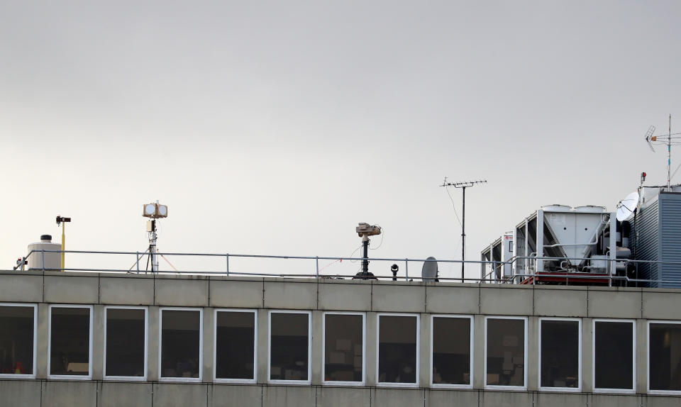 Counter drone equipment deployed on a rooftop at Gatwick airport, as the airport and airlines work to clear the backlog of flights delayed by a drone incident earlier this week.