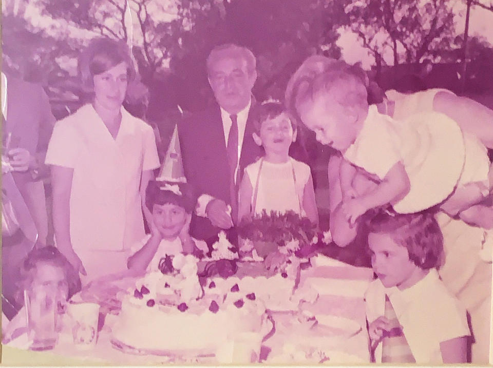 Yael Federbush, shown here at around 10 months old, is held by her grandmother and surrounded by family while celebrating a friend's birthday party.  (Courteous Yael Federbush)