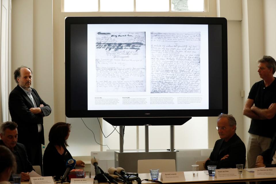 Ronald Leopold (left), executive director of the Anne Frank House, presents two unknown pages of Anne Frank's diary, during a press conference on Tuesday in Amsterdam. (Photo: BAS CZERWINSKI via Getty Images)