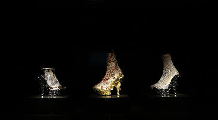 A selection of shoes are displayed in the Alexander McQueen: Savage Beauty exhibition at the V&A in London, March 12, 2015. REUTERS/Suzanne Plunkett
