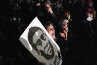 CORRECTS DAY TO FRIDAY - Tabitha Poppins chants in front of the Multnomah County Sheriff's Office during a protest against racial inequality and police violence on Friday, Aug. 7, 2020 in Portland, Ore. (AP Photo/Nathan Howard)