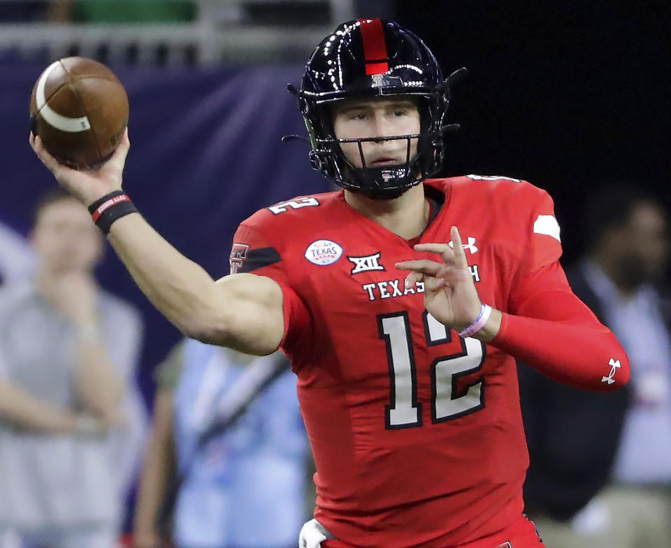 FILE - Texas Tech quarterback Tyler Shough passes the ball against Mississippi during the first half of the Texas Bowl NCAA college football game Dec. 28, 2022, in Houston. Texas Tech opens their season at Wyoming on Sept. 2.(AP Photo/Michael Wyke, File)