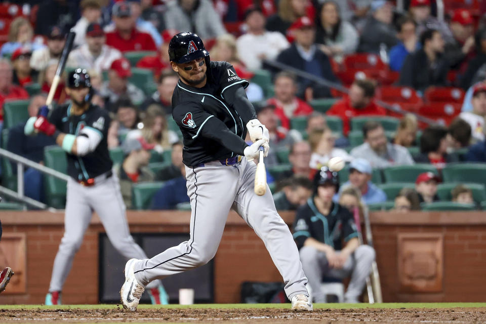 Arizona Diamondbacks' Gabriel Moreno hits an RBI single against the St. Louis Cardinals during the fifth inning of a baseball game Tuesday, April 23, 2024, in St. Louis. (AP Photo/Scott Kane)