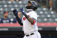 Cleveland Indians' Franmil Reyes (32) celebrates after hitting a solo home run in the second inning of a baseball game, Tuesday, April 27, 2021, in Cleveland. (AP Photo/David Dermer)