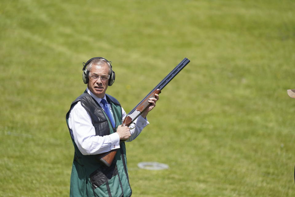 Reform UK leader Nigel Farage takes part in clay pigeon shooting during a visit to Catton Hall in Frodsham, Cheshire, Britain, while on the General Election campaign trail, Thursday June 20, 2024. (Dominic Lipinski/PA via AP)