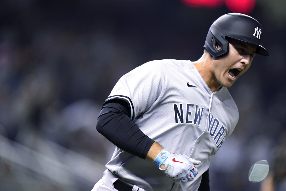 New York Yankees' Anthony Rizzo reacts as he runs the bases on a solo home run during the sixth inning of the team's baseball game against the Miami Marlins, Friday, July 30, 2021, in Miami. (AP Photo/Lynne Sladky)