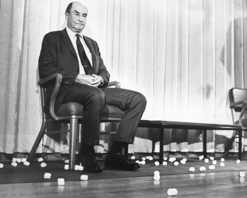 (Original Caption) 1/20/70-Pittsburgh, Pennsylvania: Guest speaker Senator Strom Thurmond, R-S. Carolina, sits dejectedly after being pelted with marshmallows, January 20, upon completion of an address to students at Carnegie-Mellon Universtity. Ph: Jerry Siskind. BPA2 #4383