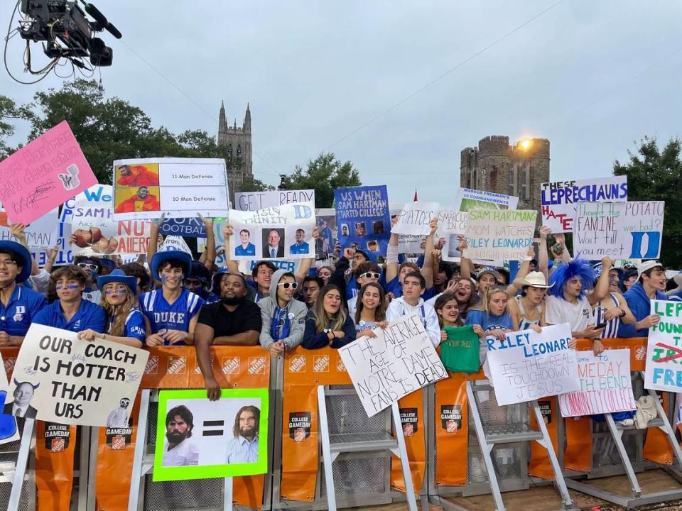 After arriving on the ESPN College GameDay set before dawn, Duke students display their handmade signs during the football show’s first visit to Duke ahead of Saturday night’s game with Notre Dame