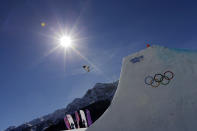 Sweden's Henrik Harlaut takes a jump during men's ski slopestyle training at the Rosa Khutor Extreme Park, at the 2014 Winter Olympics, Wednesday, Feb. 12, 2014, in Krasnaya Polyana, Russia. (AP Photo/Andy Wong)