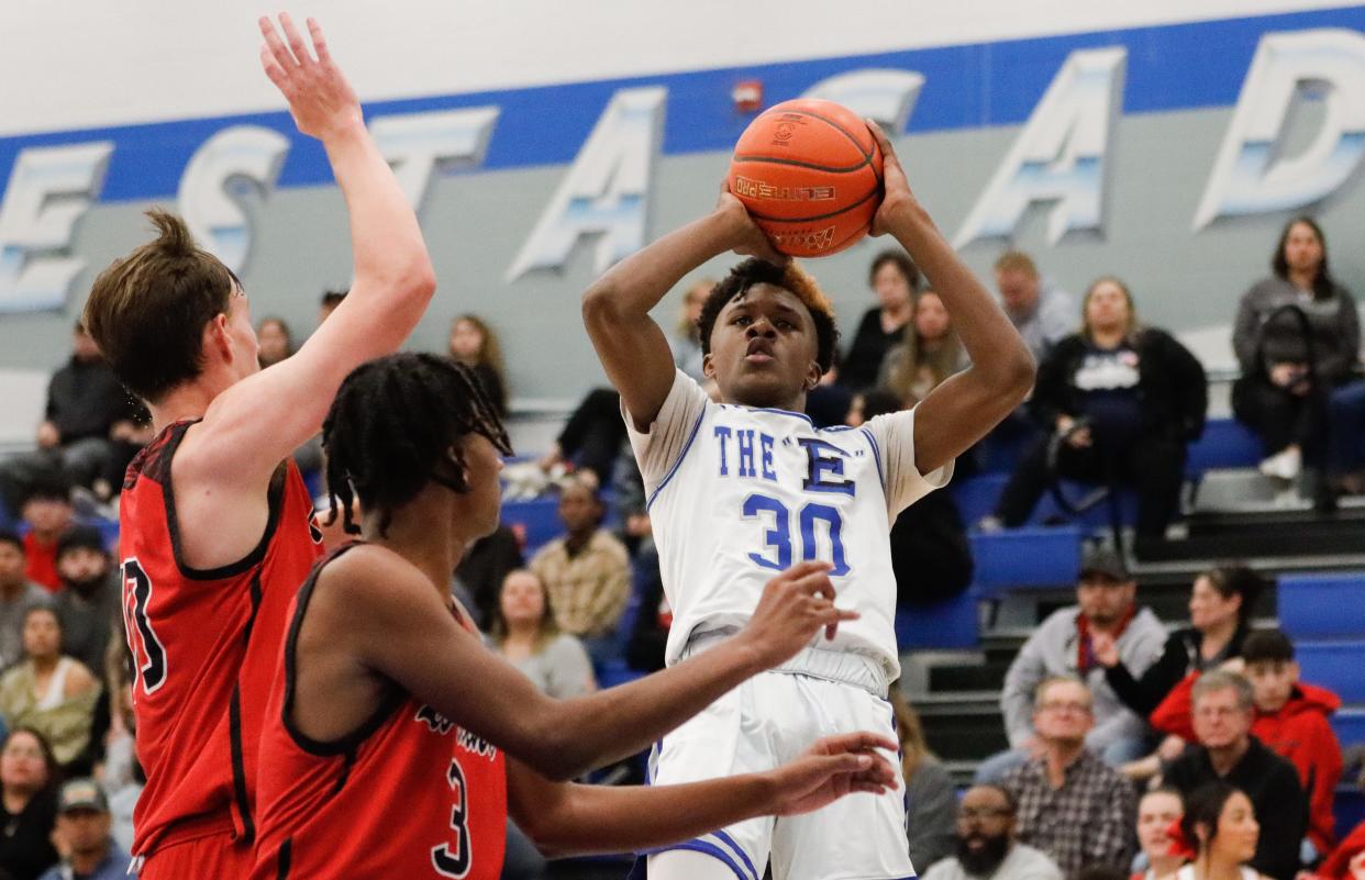 Estacado's Moses Stephenson (30) shoots for a 3-pointer against Levelland in a District 5-4A basketball game, Tuesday, Jan. 17, 2023, at Estacado High School.