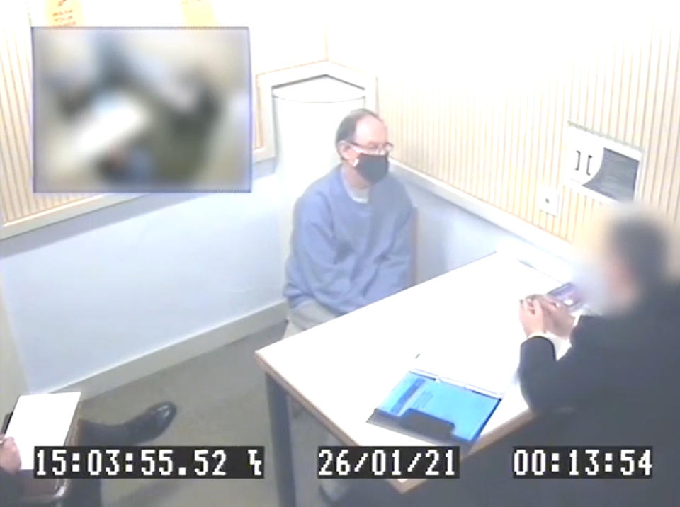 CCTV issued by Kent Police of shows Fuller being questioned on the murders. (PA)