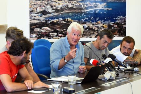 U.S. actor Richard Gere holds a news conference in support of an NGO ship "Open Arms", which carries stranded migrants, in Lampedusa