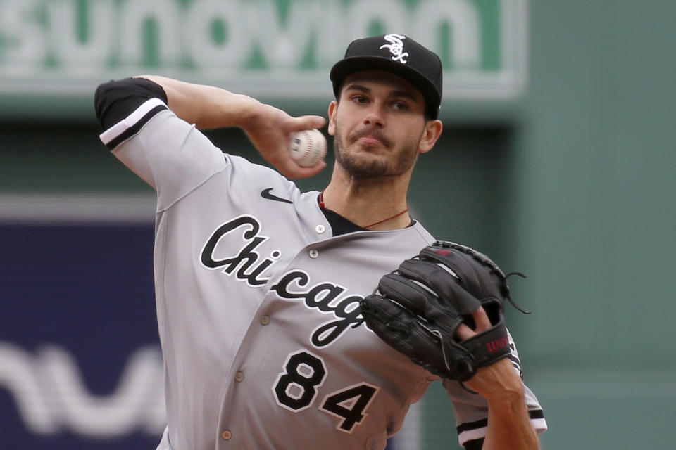 Chicago White Sox starting pitcher Dylan Cease pitches to a Boston Red Sox batter during the first inning of a baseball game, Saturday, April 17, 2021, in Boston. (AP Photo/Mary Schwalm)