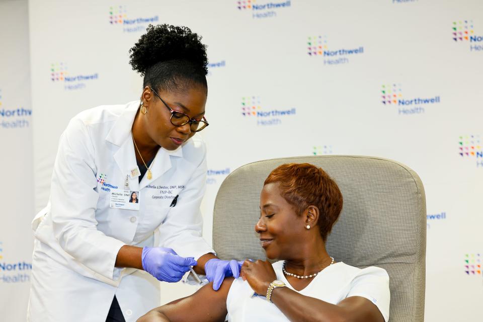 Nurse Sandra Lindsay, the first American to receive the COVID-19 vaccine in 2020, became the first American to get the Pfizer 2023-24 COVID-19 vaccine in New York on Sept. 13, 2023. 
(Credit: Lee S. Weissman-Submitted by Northwell Health)