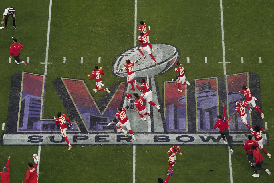 The Kansas City Chiefs rush the field after their victory over the San Francisco 49ers during the NFL Super Bowl 58 football game Sunday, Feb. 11, 2024, in Las Vegas. (AP Photo/Godofredo A. Vásquez)