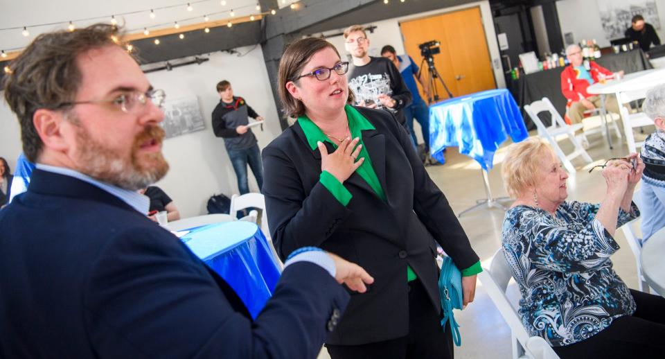 Monroe Circuit Court 7 Judge-elect Emily Salzmann reacts to her lead as the vote totals are shown at the Democratic primary election watch party at The Mill on Tuesday, May 3, 2022.