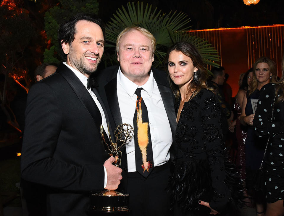 <p>Louie Anderson (<em>Baskets</em>) got a photo op with one of the night’s most beloved couples, Keri Russell and new Emmy winner Matthew Rhys. (Photo: Araya Diaz/Getty Images) </p>