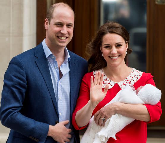 <p>Mark Cuthbert/UK Press/Getty</p> (From left) Prince William and Kate Middleton with Prince Louis on the steps of the Lindo Wing at St. Mary's Hospital in London on April 23, 2018.