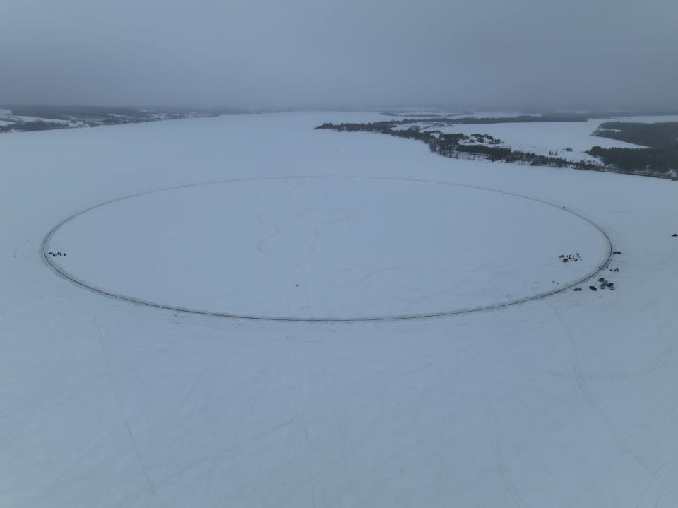 This photo provided by Aroostook UAS shows a giant ice disk that measures 1,776 feet – or 541 meters– is seen on the day it was set in motion, creating the world's largest ice carousel, on Saturday, April 1, 2023, in Long Lake in Madawaska, Maine. (Aroostook UAS via AP)