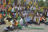 Activists belonging to various farmers rights organisations stage an anti-government demonstration to protest against the recent passing of new farm bills in parliament, in Bangalore on September 28, 2020. (Photo by Manjunath Kiran / AFP) (Photo by MANJUNATH KIRAN/AFP via Getty Images)