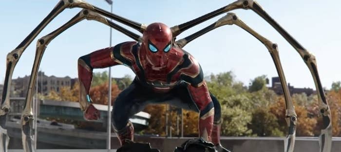 Spider-Man, in his Iron Spider suit, crouching with four extra mechanical arms in "Spider-Man: No Way Home