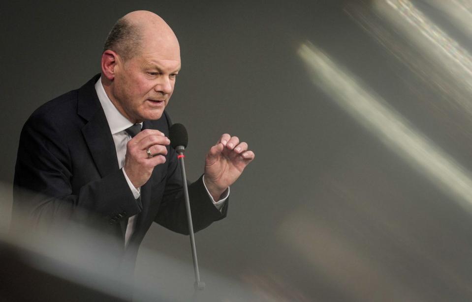 Chancellor Olaf Scholz speaks in German parliament. The "Taurus wiretapping scandal" is also to be debated in a question and answer session. (Michael Kappeler/picture alliance via Getty Images)