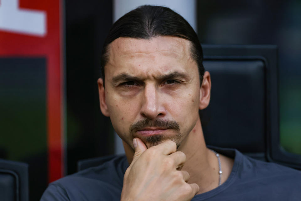 MILAN, ITALY - OCTOBER 22: Zlatan Ibrahimovic of AC Milan reacts as he sits in the tribune while still recovering from injury during the Serie A match between AC Milan and AC Monza at Stadio Giuseppe Meazza on October 22, 2022 in Milan, Italy. (Photo by Jonathan Moscrop/Getty Images)