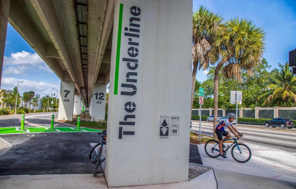 A cyclist rides past the Vizcaya Metroral Station along U.S. 1 on a new, two-mile section of The Underline urban trail and linear park that opens April 24. Pedro Portal/pportal@miamiherald.com