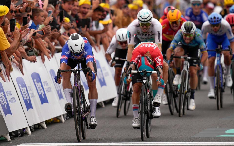 Caleb Ewan (right) narrowly misses out on victory on stage four to Jasper Philipsen