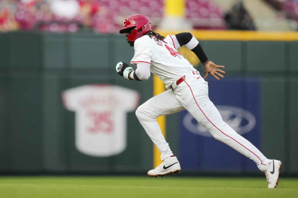 Cincinnati Reds' Elly De La Cruz steals third base during the second inning of a baseball game against the Milwaukee Brewers in Cincinnati, Monday, April 8, 2024. (AP Photo/Aaron Doster)
