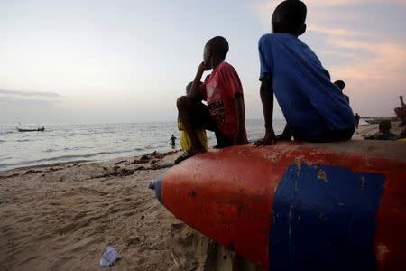 FILE PHOTO: Children are seen at the beach in the township of West Point, in Monrovia, Liberia, October 18, 2017. REUTERS/Thierry Gouegnon/File Photo