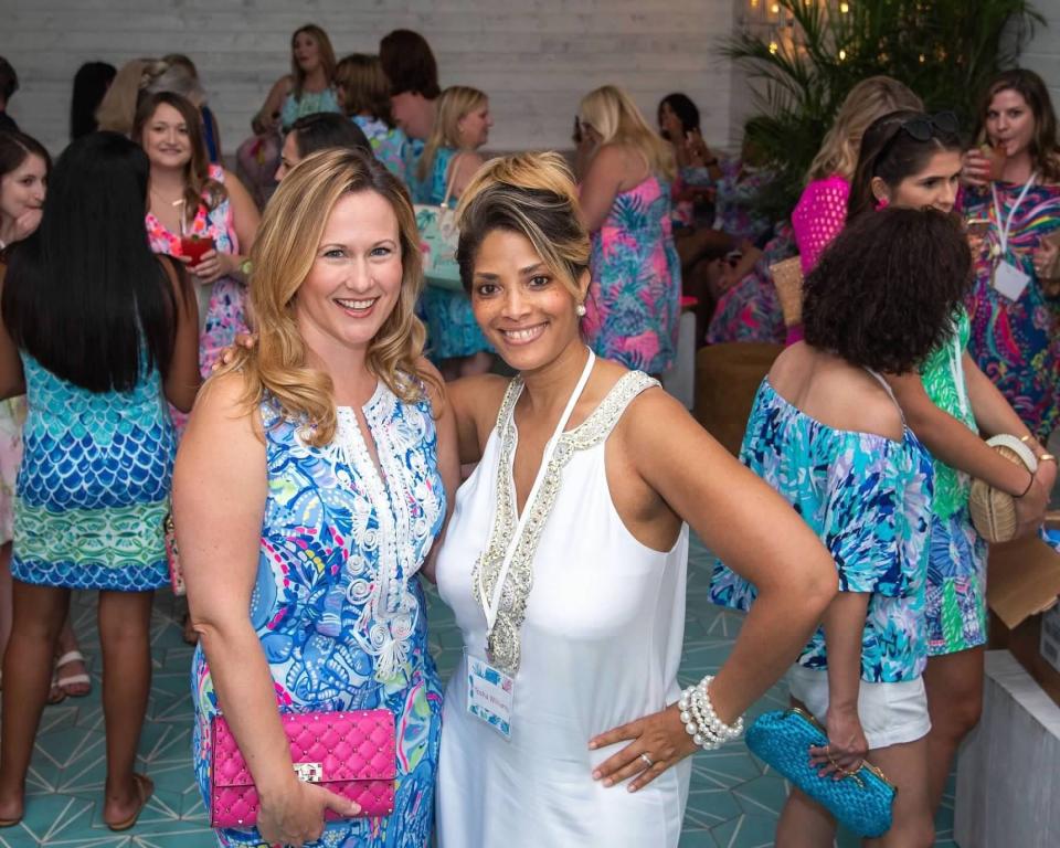 Lilly Pulitzer CEO Michelle Kelley (left) and Tosha Williams, founder of The Pink Retreat, celebrate the Lilly Pulitzer brand during a happy hour as part of the 2018 Pink Retreat in Palm Beach.