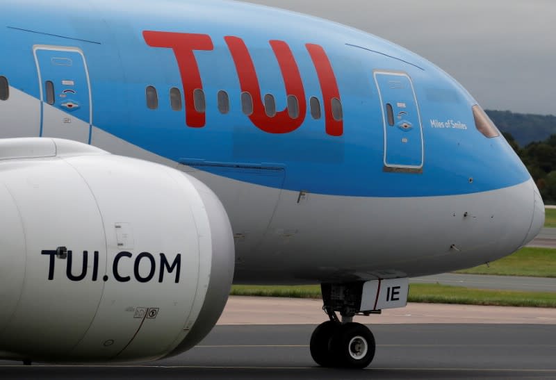 FILE PHOTO: A TUI jet prepares to take off from Manchester Airport