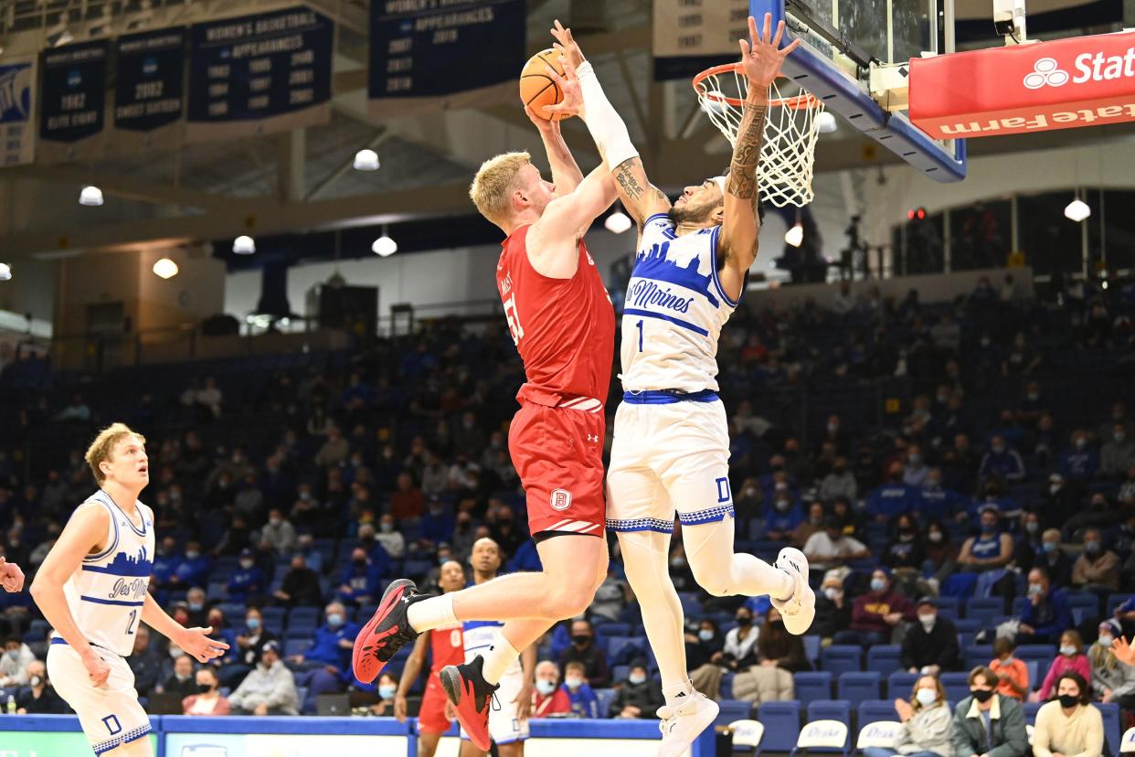 Bradley forward Rienk Mast battles at the rim with Drake star Roman Penn during BU's 83-71 upset victory at Knapp Center in Des Moines, Iowa, on Wednesday, Jan. 19, 2022.