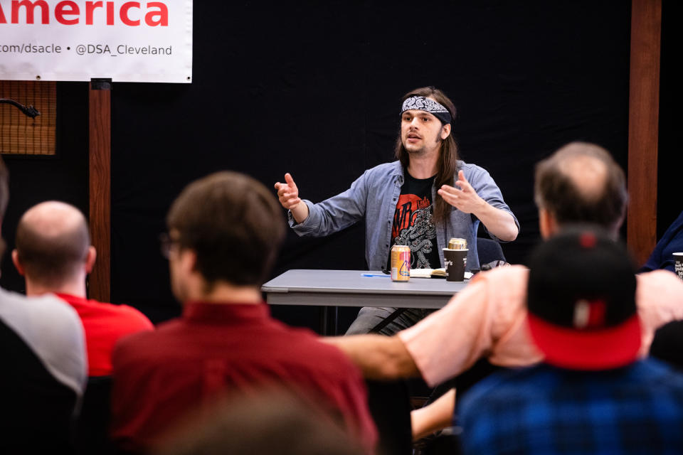 Tim Faust speaks at the Cleveland library at an event to promote single-payer health care sponsored by the Democratic Socialists of America. (Photo: Angelo Merendino for Yahoo News)