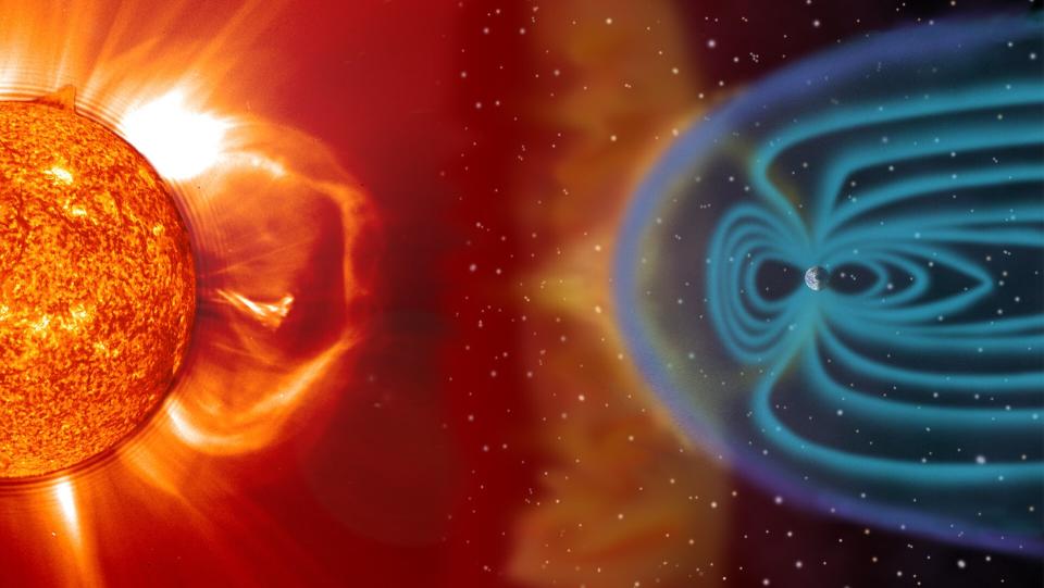 red rays radiating out from the sun are deflected by blue rays emanating from Earth
