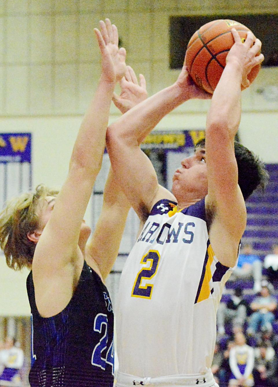 Watertown's Cole Holden (2) shoots against Sioux Falls Christian's Jaden Witte during their high school boys basketball game Saturday night in the Civic Arena. Sioux Falls Christian won 64-52.