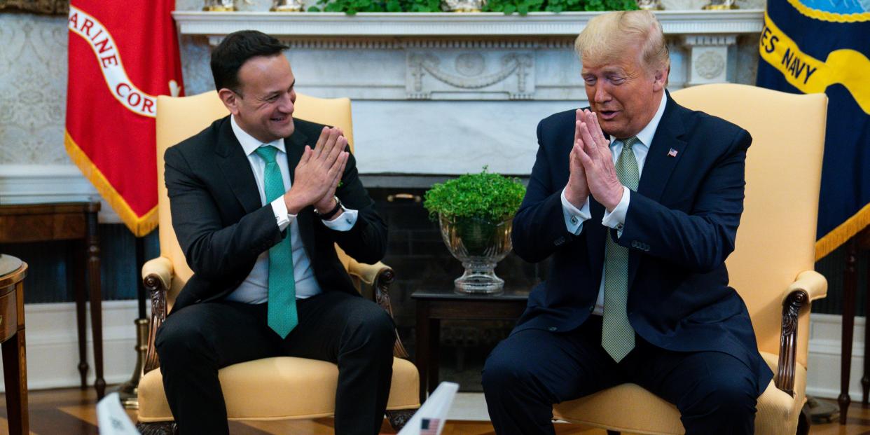 President Donald Trump and Irish Prime Minister Leo Varadkar joke about not shaking hands during a meeting in the Oval Office of the White House, Thursday, March 12, 2020, in Washington. (AP Photo/Evan Vucci)