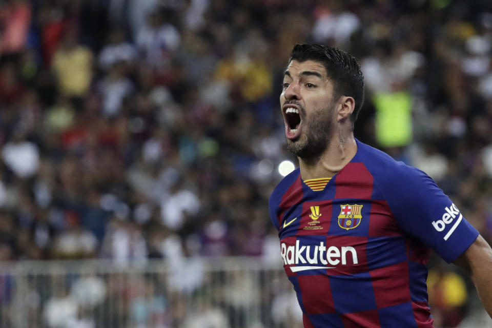 El uruguayo Luis Suárez reacciona durante el encuentro semifinal entre el Barcelona y el Atlético de Madrid en Yeda, Arabia Saudí, el jueves 9 de enero de 2020 (AP Foto/Hassan Ammar)
