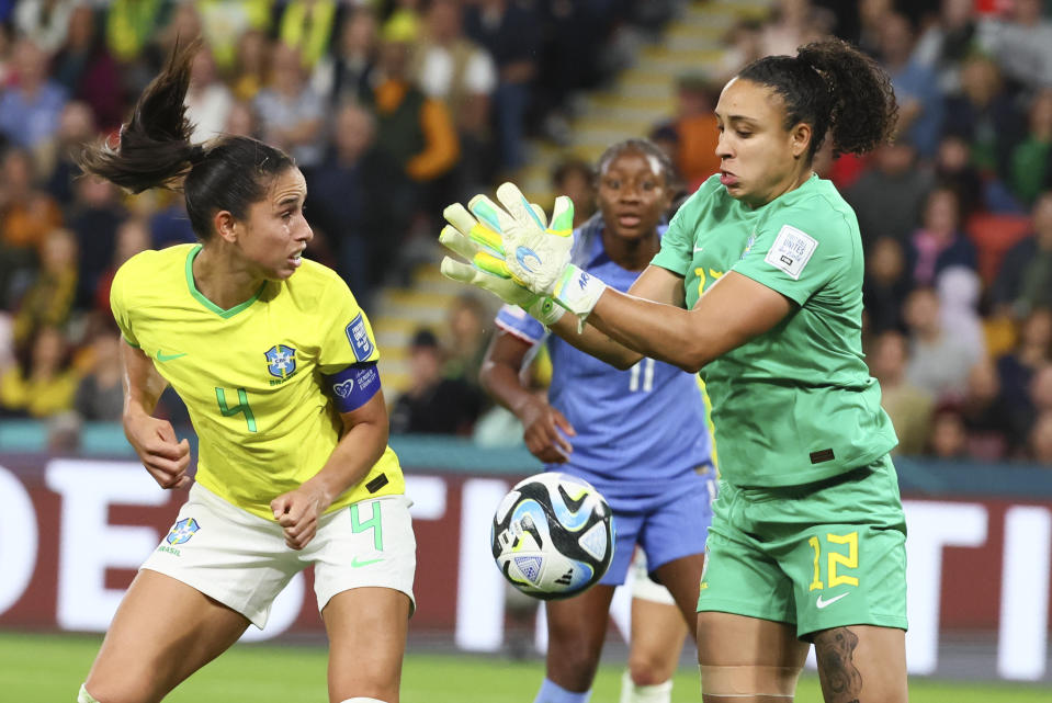 Brazil's goalkeeper Leticia, right, and Rafaelle look to clear the ball during the Women's World Cup Group F soccer match between France and Brazil in Brisbane, Australia, Saturday, July 29, 2023. (AP Photo/Tertius Pickard)