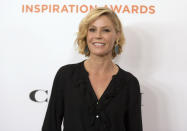 FILE - This June 1, 2018 file photo shows Julie Bowen at the Inspiration Awards benefiting Step Up in Beverly Hills, Calif. In a world turned upside down by disease, TV viewership is growing. It's a rare bit of good news for an industry that has steadily shrunk, and its executives hope to seize an opportunity by anticipating what a stressed audience wants to see. Bowen of “Modern Family” and her children binged on the NBC comedy, “Brooklyn Nine-Nine.” (Photo by Richard Shotwell/Invision/AP, File)