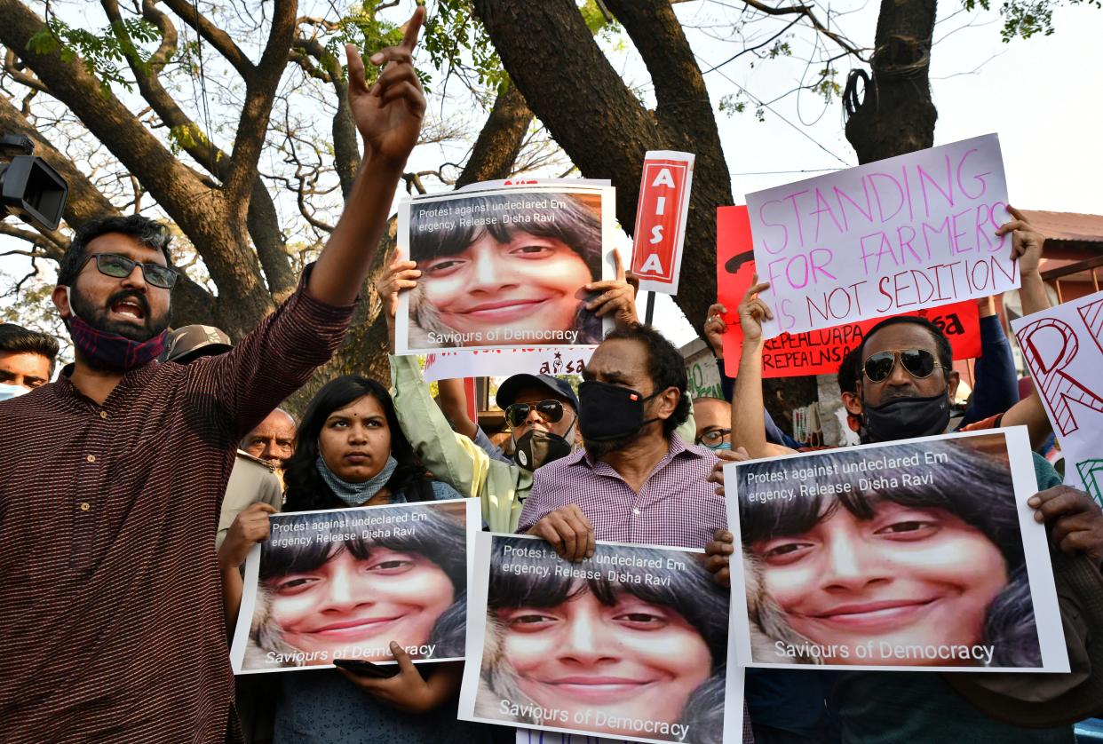 <p>Several people hit the streets in Bangaluru city, India to protest against the arrest of climate activist Disha Ravi on 15 February </p> (REUTERS)