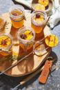 <p>Grill or broil oranges for an extra-flavorful caramelized take on this classic warming winter drink. </p><p><strong><a href="https://www.countryliving.com/food-drinks/a34945104/hot-toddy-with-charred-oranges-recipe/" rel="nofollow noopener" target="_blank" data-ylk="slk:Get the recipe for Hot Toddy with Charred Oranges;elm:context_link;itc:0;sec:content-canvas" class="link ">Get the recipe for Hot Toddy with Charred Oranges</a>.</strong></p>