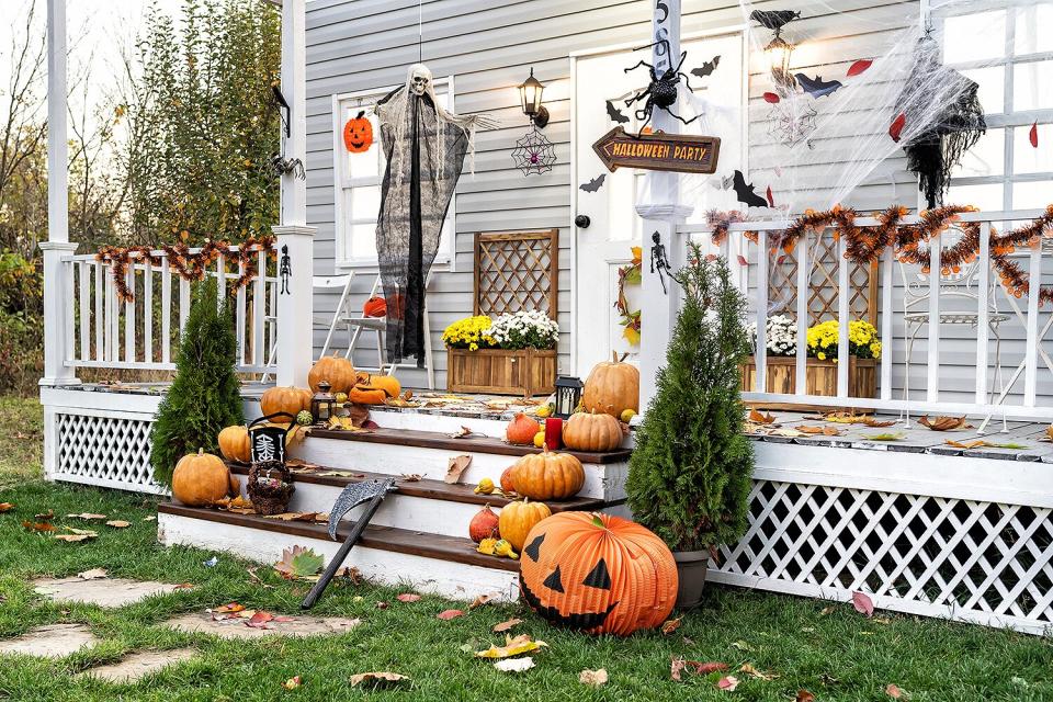 Halloween Jack-o-Lantern Pumpkins on a porch stairs