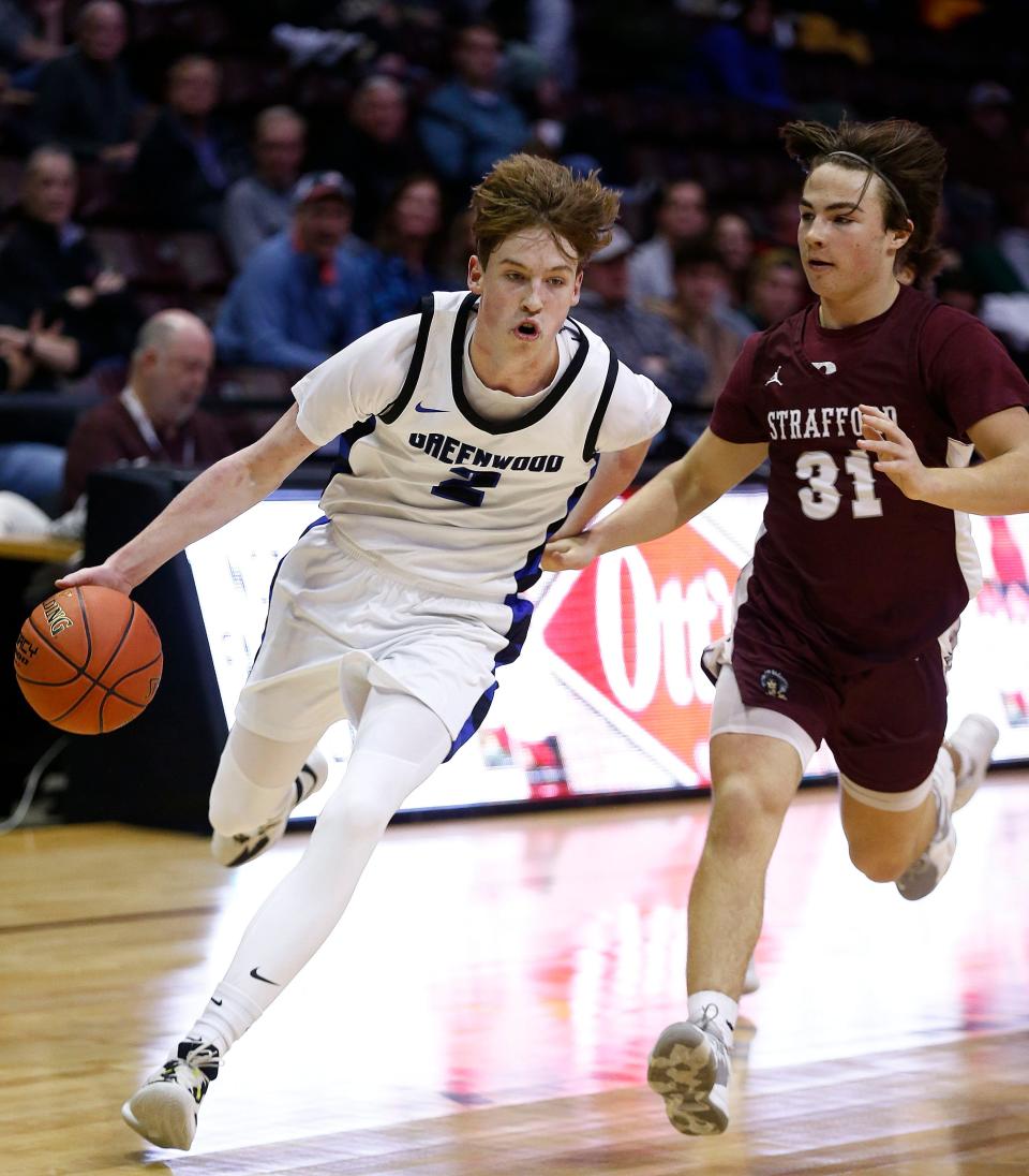 Greenwood's Collin Clark drives to the basket during the Blue Jays' game vs. Strafford during Blue and Gold tournament action at Great Southern Bank Arena in Springfield on December 27, 2022.