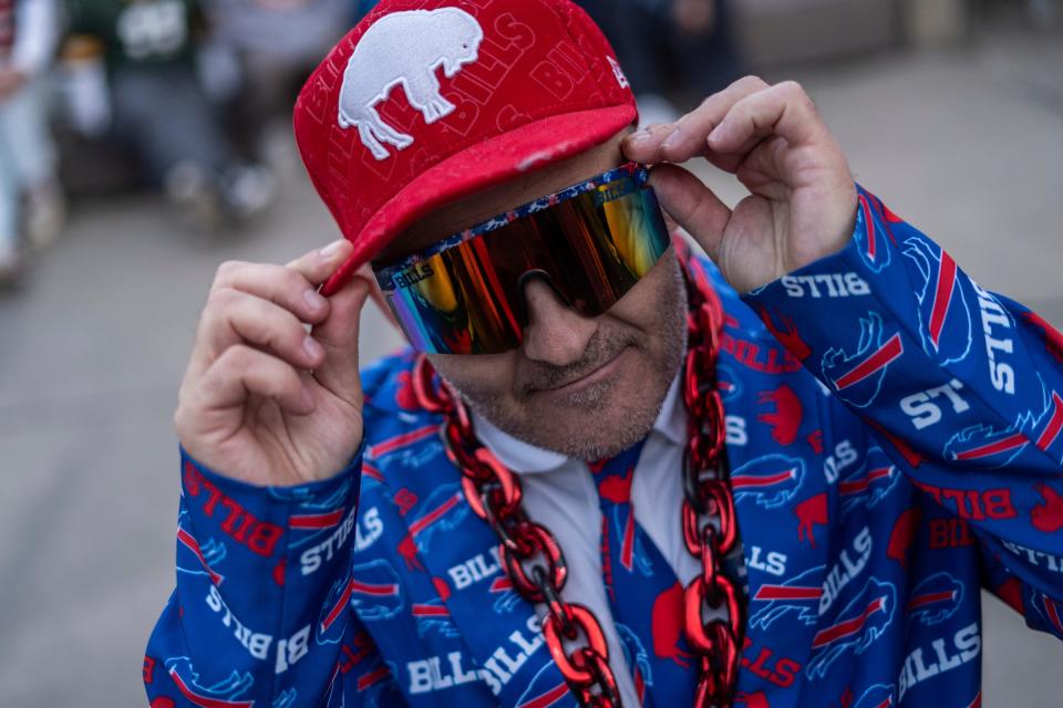 Buffalo Bills fan Darryl Russell, of Brantford, Ontario, shows off his outfit during the NFL Draft Experience at Hart Plaza in downtown Detroit on Thursday, April 25, 2024.