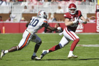Arkansas tight end Hudson Henry (82) tries to run past Auburn defensive back Zion Puckett (10) during the second half of an NCAA college football game Saturday, Oct. 16, 2021, in Fayetteville, Ark. (AP Photo/Michael Woods)