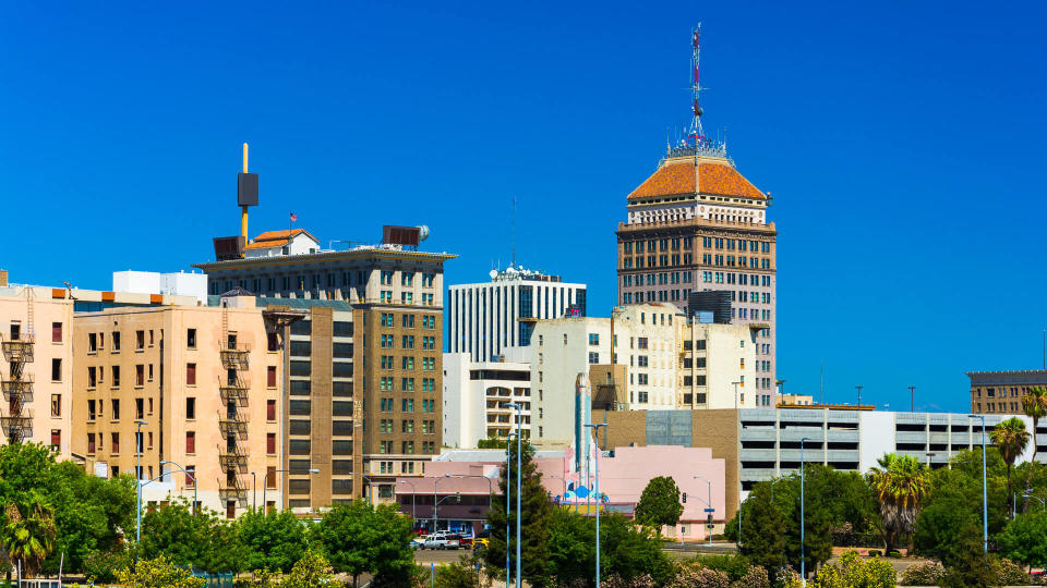 Fresno downtown skyline view with a clear blue sky in the background.